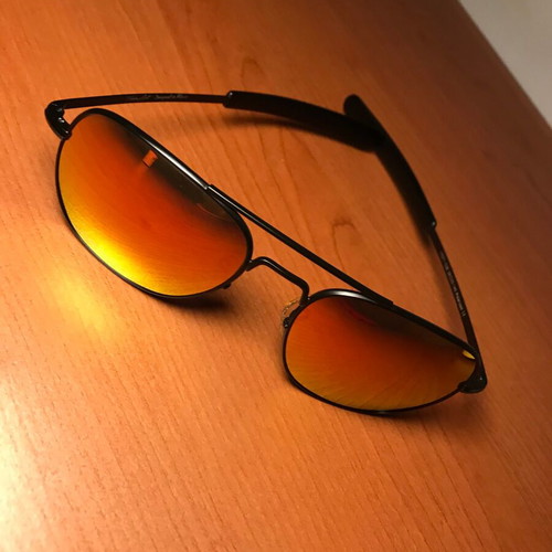 Sunglasses like new with orange/red mirror lenses