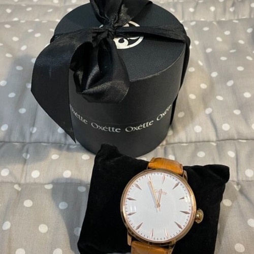 Oxette wristwatch used, brown leather strap, gold details