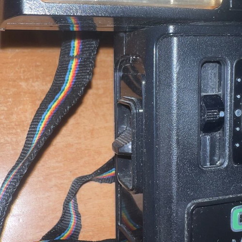 Polaroid Colorburst 250 camera used with original strap