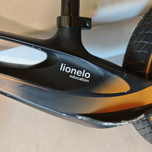 Lionelo Bart Air balance bike used, black orange