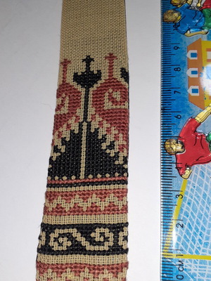 Handmade bookmark with embroidered pattern in black and ecru