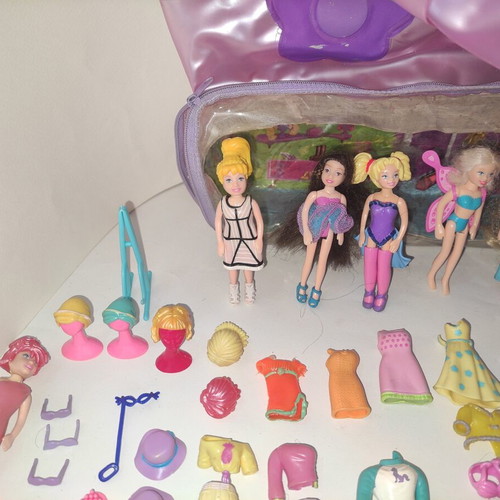 Polly Pocket bag with 9 dolls and accessories used