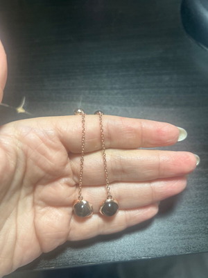 Dangling earrings, black and gold