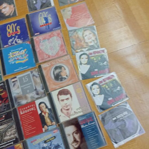 43 assorted DVDs with songs and movies