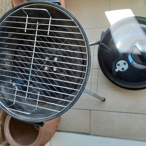 Bormann Charcoal Grill used with wheels and shelf