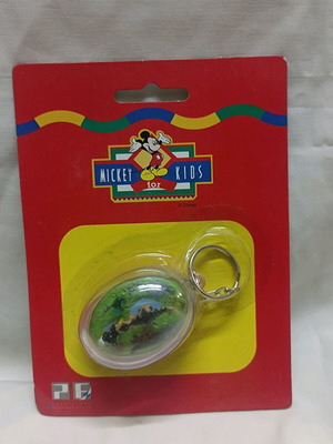 Mickey Mouse/Dinosaurs Moving Keychain like new