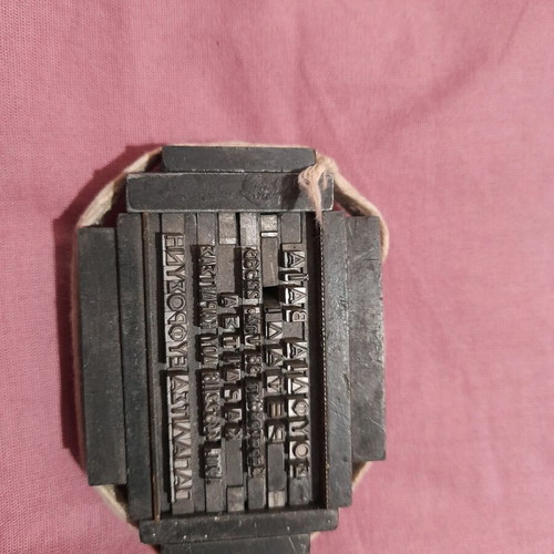 Typographic machine plate used, composed of letter elements