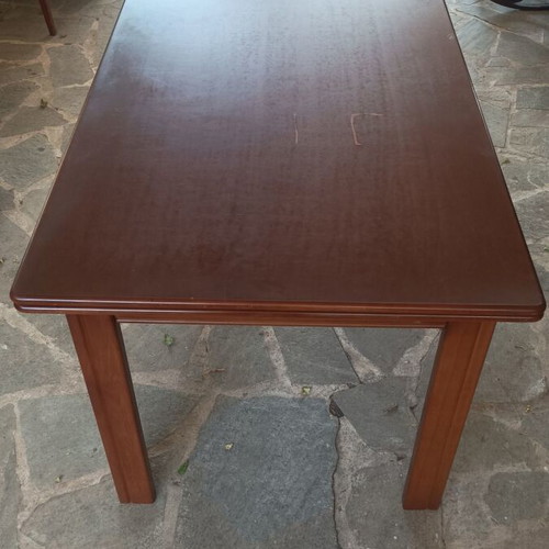 Wooden dining table used with extension