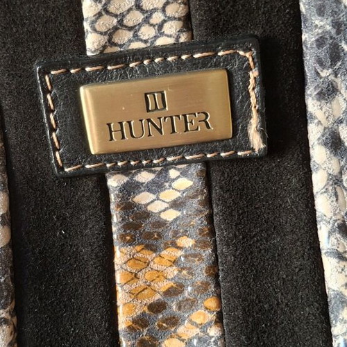Hunter leather shoulder bag like new, black with multicolor snake print