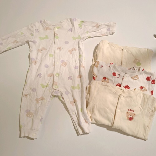Labi Baby set of 4 full-body baby rompers like new 3-6 months