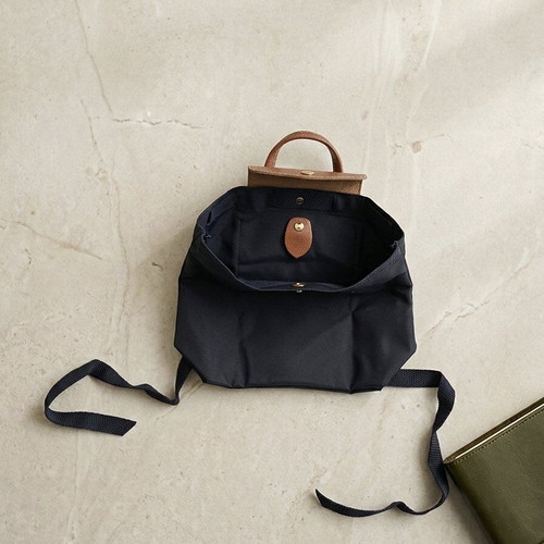 Smart foldable backpack like new, black with brown details