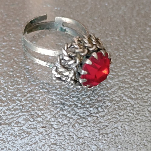 Old ring used, gray with red stone
