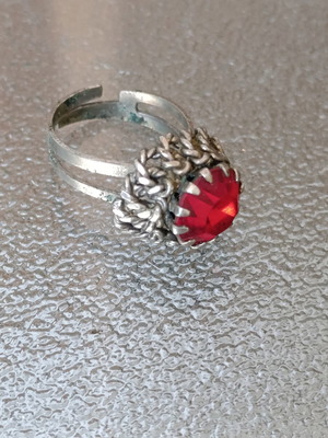 Old ring used, gray with red stone