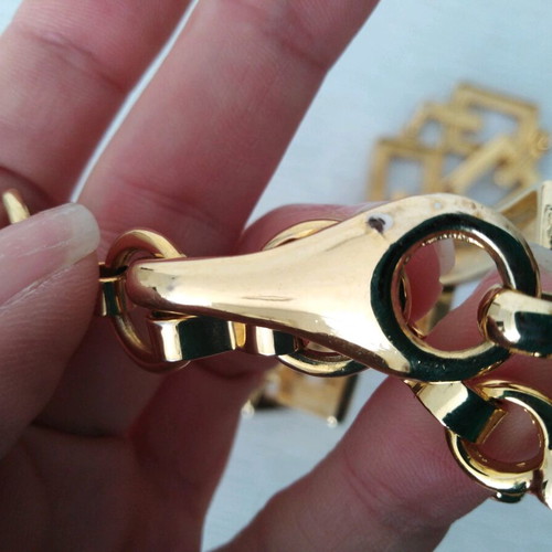 Metallic gold-plated belt with geometric design like new, 105 cm