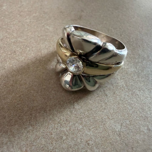 Silver and gold ring with diamond used