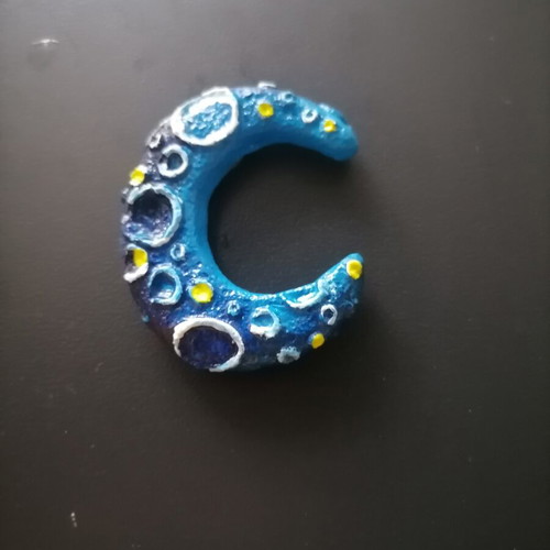 Handmade magnet from white cement with acrylics and varnish