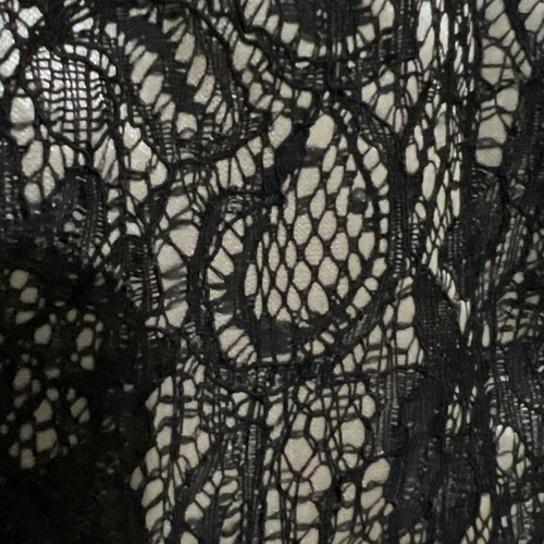 Evening dress knee-length black with sewn lace on champagne fabric like new