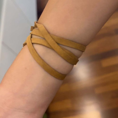 Leather bracelet with crystal in beige and gold tones, like new