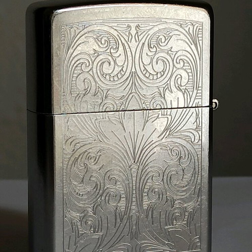 Zippo vintage lighter 2003, new, embossed design
