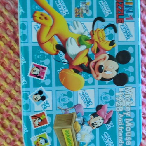 Mickey Mouse puzzle 60 pieces in metal box like new
