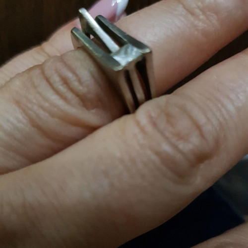 Silver ring with zircon used