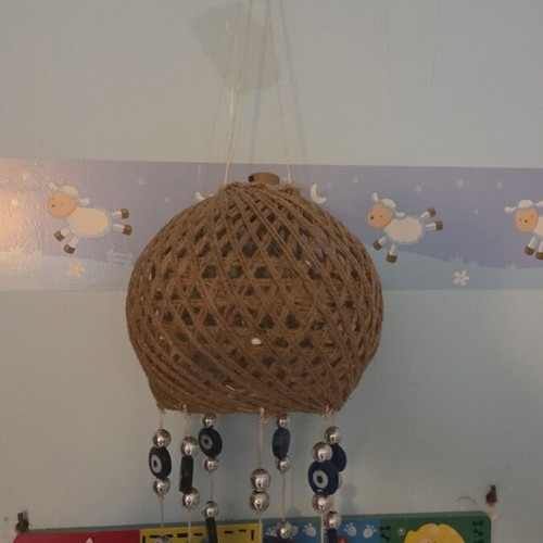 Ceiling decoration with blue matohandra beads, about 70 cm height
