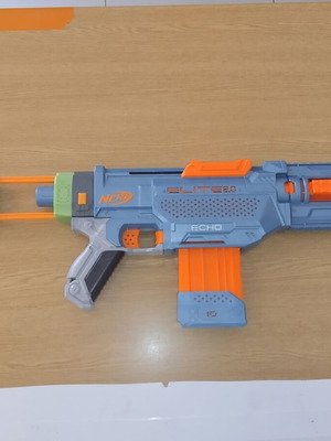 Nerf Echo toy blaster with 10-dart magazine and large stock
