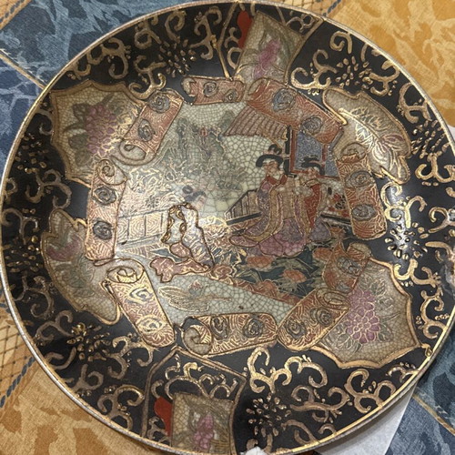 Decorative handmade plate used with embossed design and damage