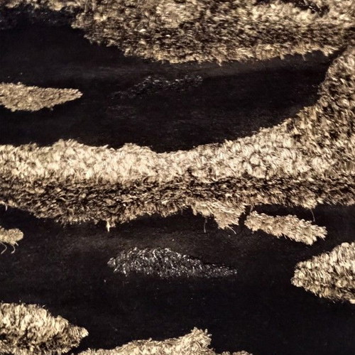 Black and silver rug with embossed designs 216x155 cm