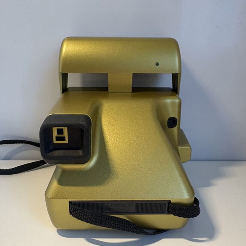 Polaroid OneStep AF camera, gold, for parts or repair