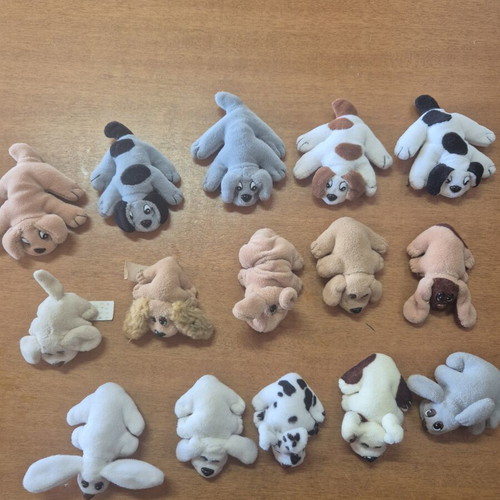 Pound Puppies used, pack of 15 small and large dogs