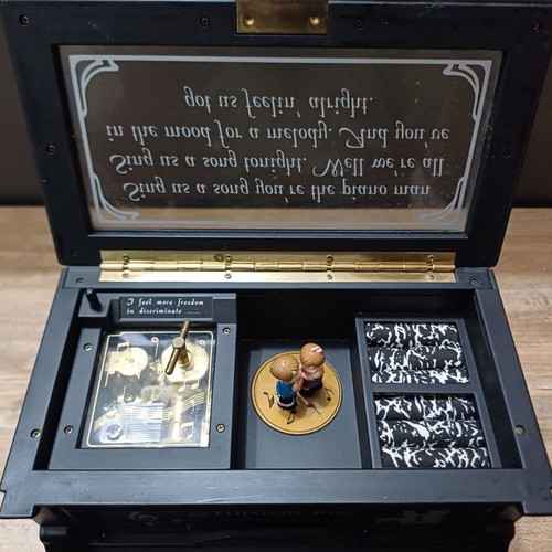 Piano music box used with compartments for small jewelry plastic