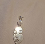 Handmade face earring silver used