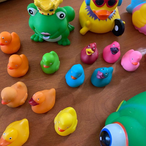Collection of ducks and fish toys used for decoration and crafts