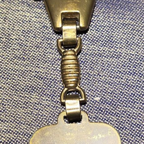 Vintage Playboy keychain like new, black and gold
