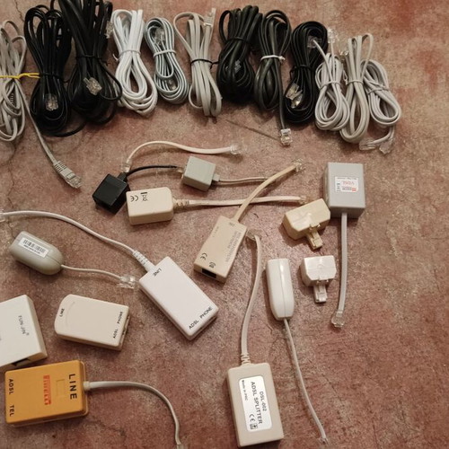 Telephone cables and parts used, switch and splitter included