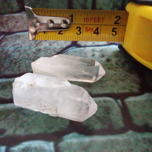 Clear quartz points set like new, two pieces