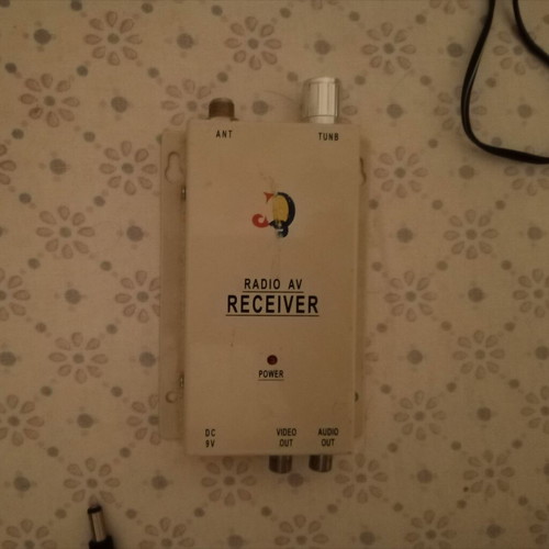 Wireless audio and video receiver with power supply