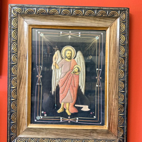 Old decorative angel icon used with mixed technique in frame