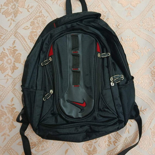 Nike travel backpack with 8 compartments