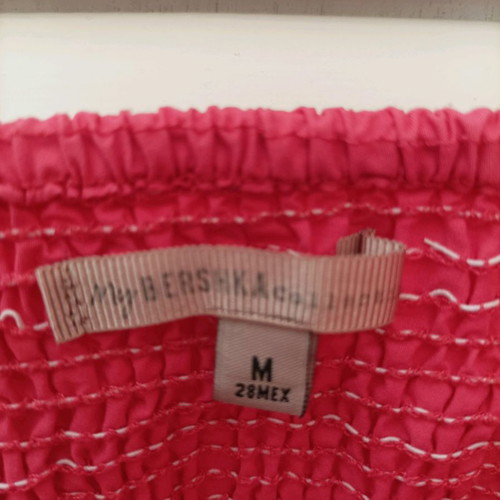 Strapless coral dress used, size Medium 28