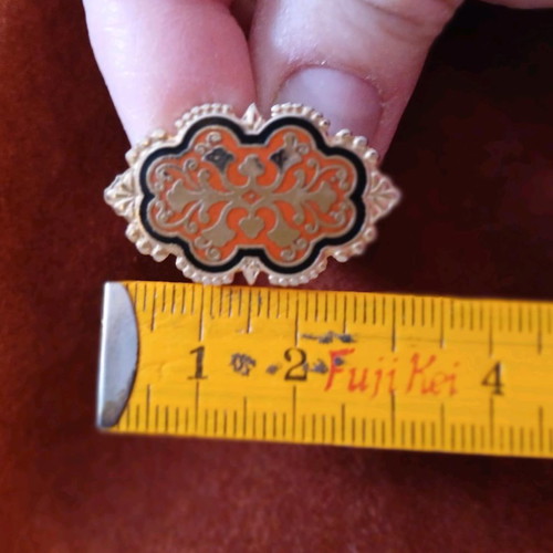 Orofix cufflinks used, vintage, embossed gold on coral background