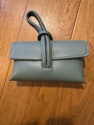 Leather spring handbag like new, mint color