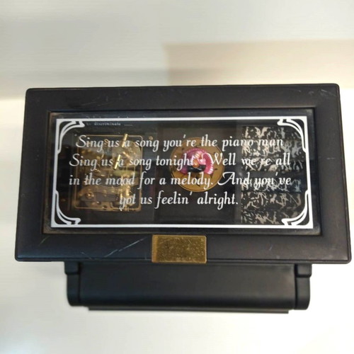 Decorative piano music box used from the 1970s with jewelry storage