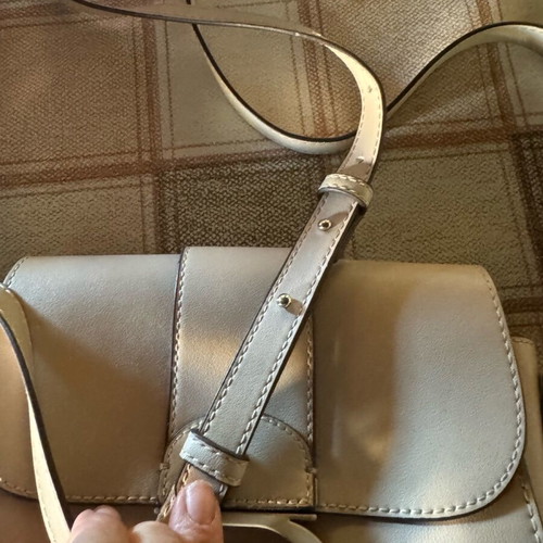 Women's beige crossbody bag like new with adjustable strap