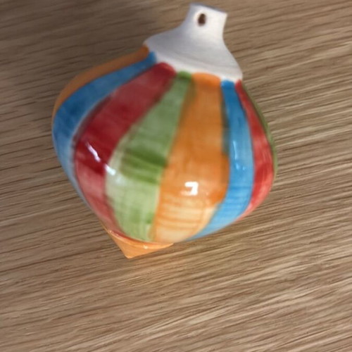 Decorative ceramic spinning top like new