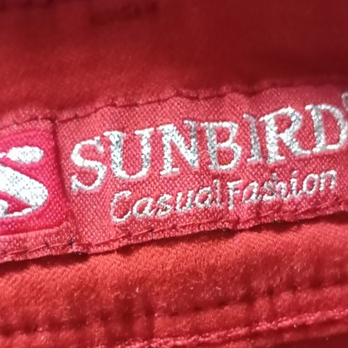 Sunbird women's sports pants like new, brick red, size 34