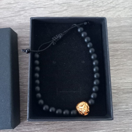 Unisex bracelet with black matte beads and lion head new