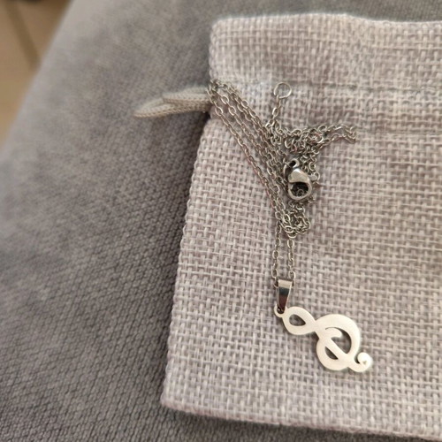 Treble clef necklace