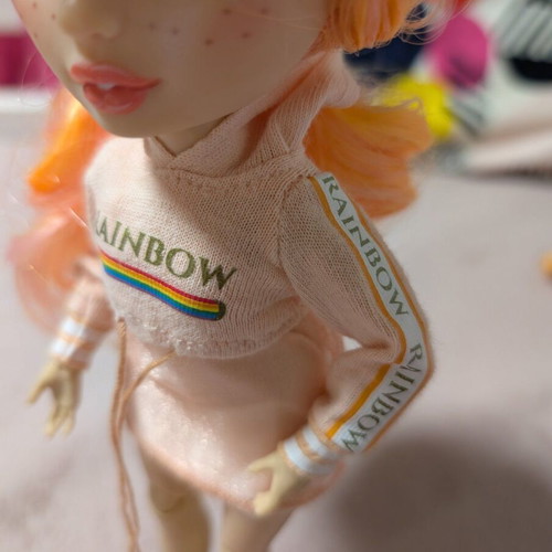 Rainbow High Poppy Rowan Fashion Doll with 2 Mix & Match Outfits, like new